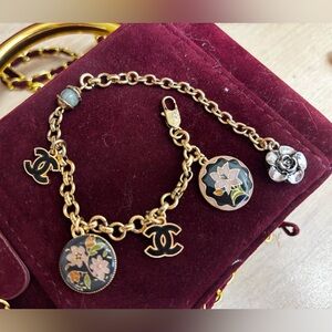 CHANEL Gold-Tone Floral Charm Bracelet with Black and Pink Enamel